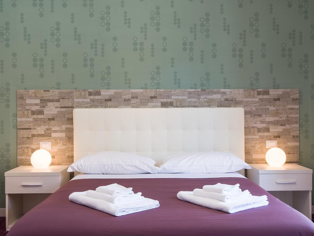 Quadruple Room with Private Bathroom and Balcony
