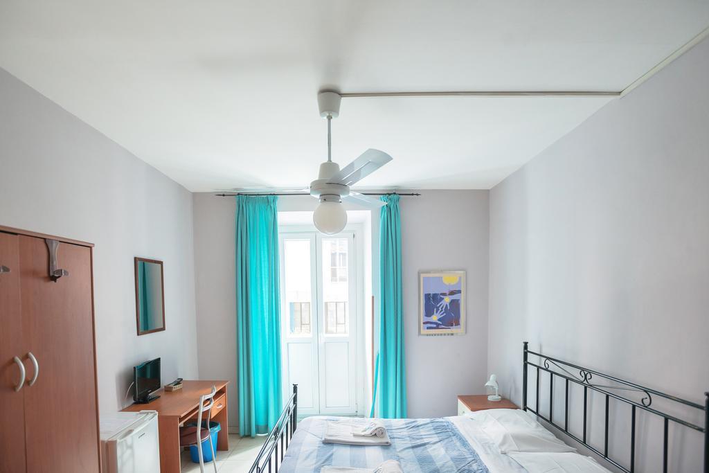 Quadruple Room with Shared Bathroom